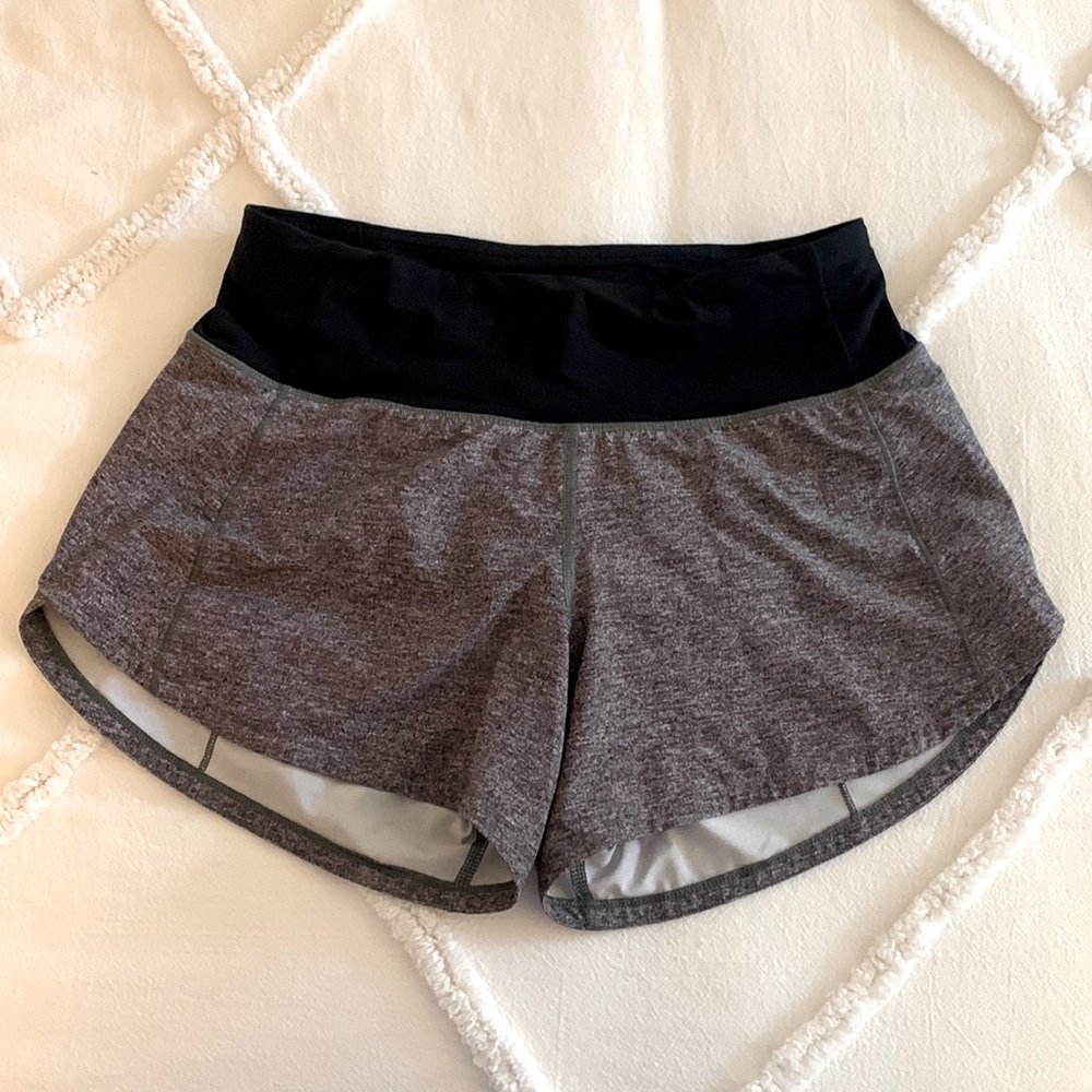 Grey Lululemon athletic shorts, size 4 in US, CA, and MX